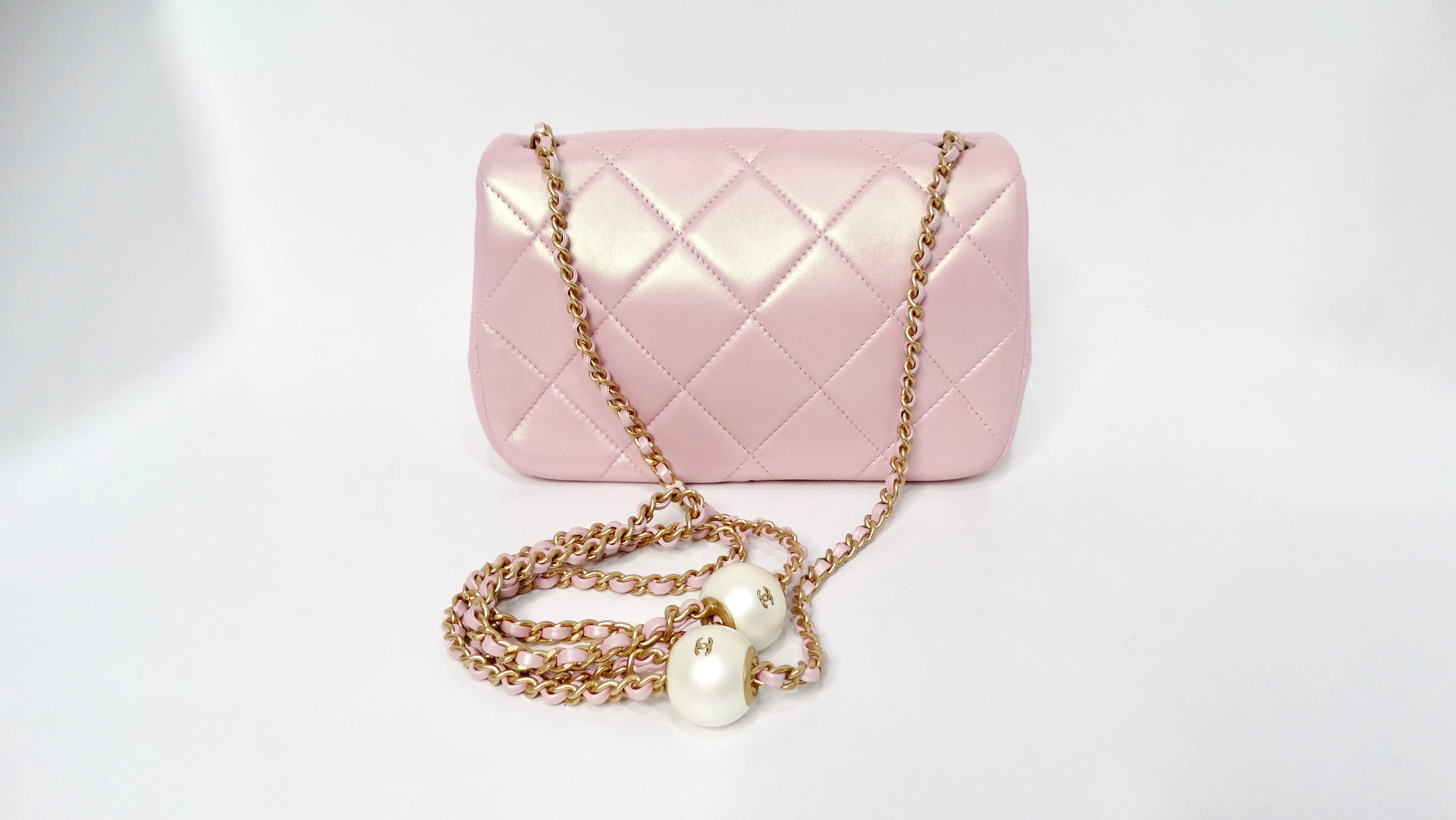 Chanel 2024 Pink Pearly Iridescent Quilted Lambskin Leather Mini Crossbody Bag