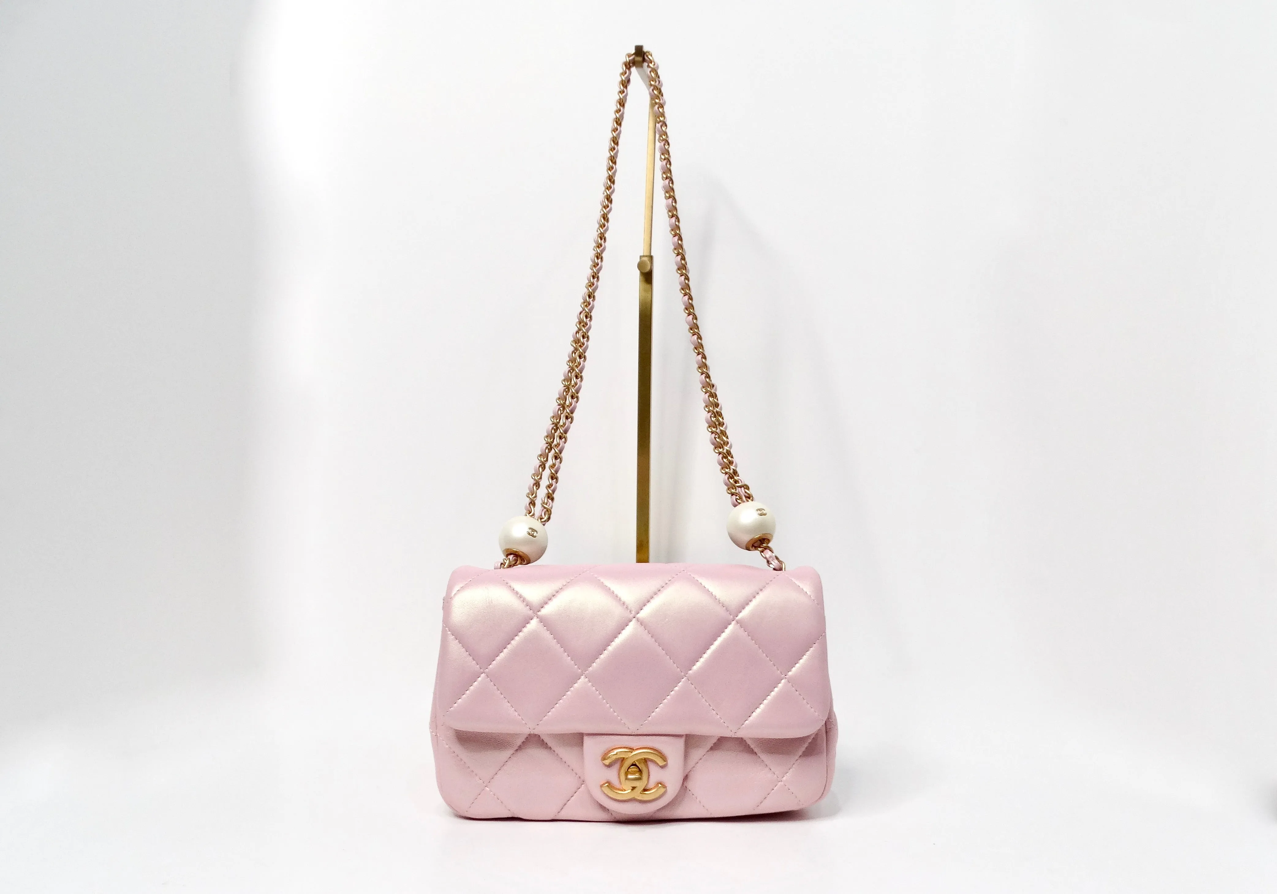 Chanel 2024 Pink Pearly Iridescent Quilted Lambskin Leather Mini Crossbody Bag